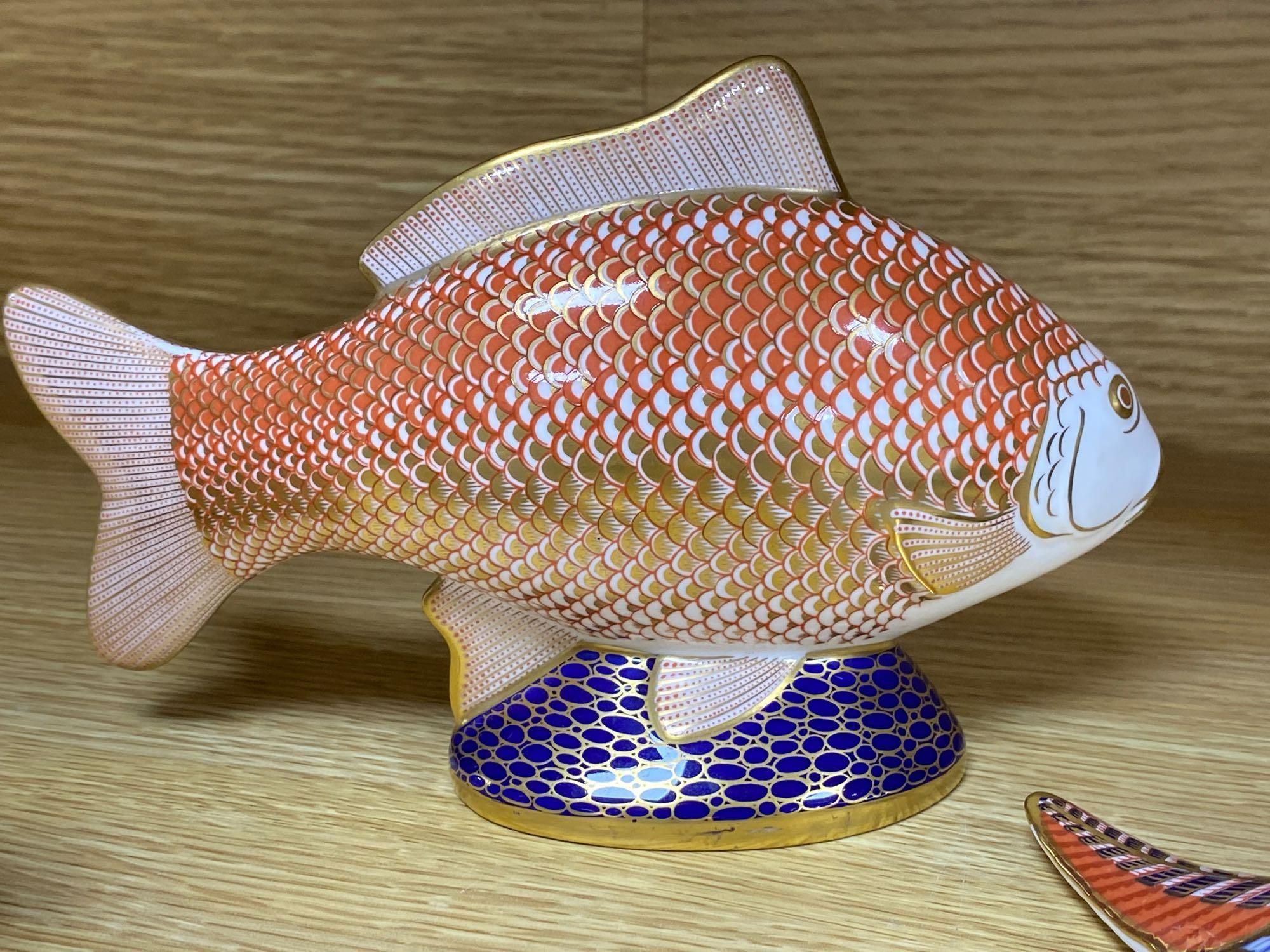 A graduated set of Beswick flying ducks and five Royal Crown Derby animal paperweights and another similar rabbit, fish 18cm